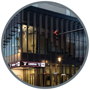 Image of exterior building representing a national account program for multi-location standardization of lighting design, specification, and procurement decisions.
