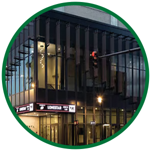 Image of exterior building representing a national account program for multi-location standardization of lighting design, specification, and procurement decisions.